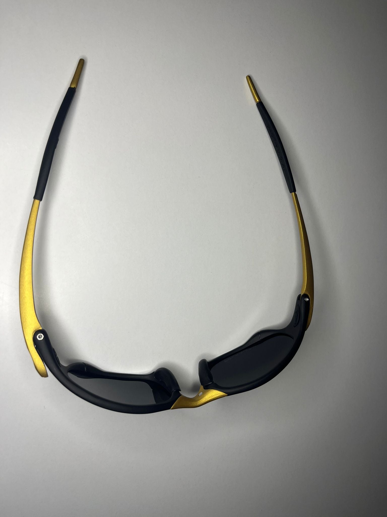 Resolute- Gold and Black Frame - Blue/Green Lenses- Polarized