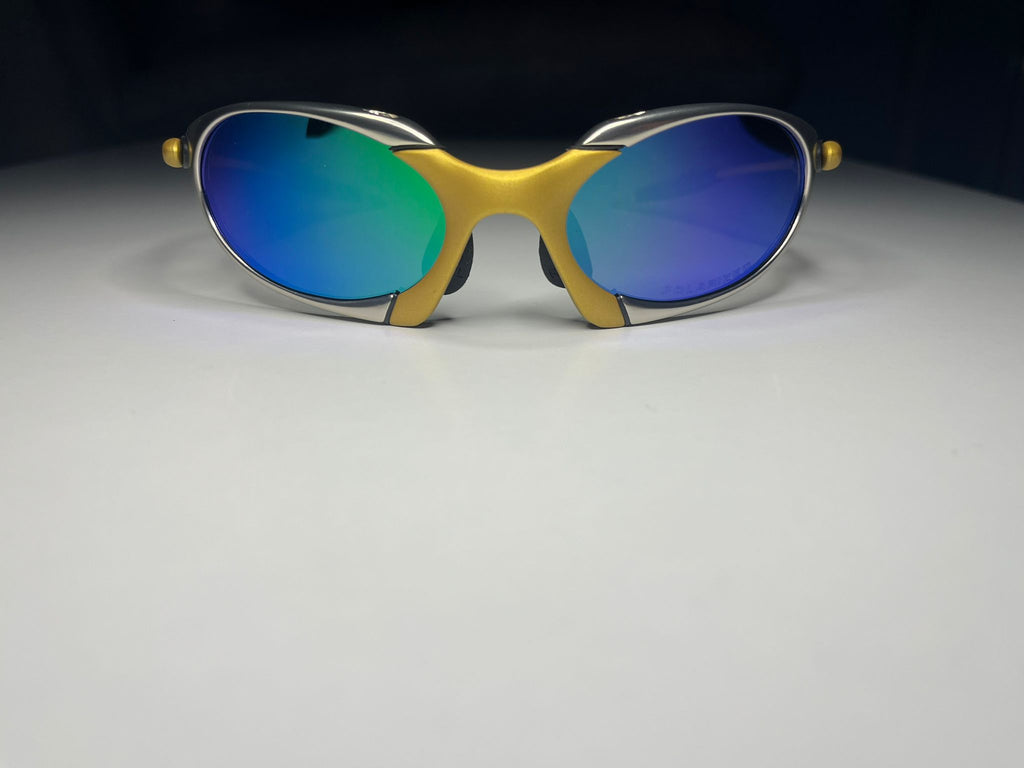 Predator- Silver and Gold Frames- Green Blue Lenses Polarized