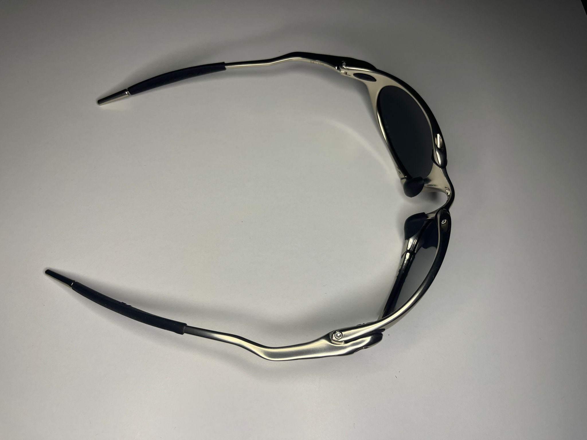 Predator- Polished Silver Frame- Black Iridium Lenses Polarized