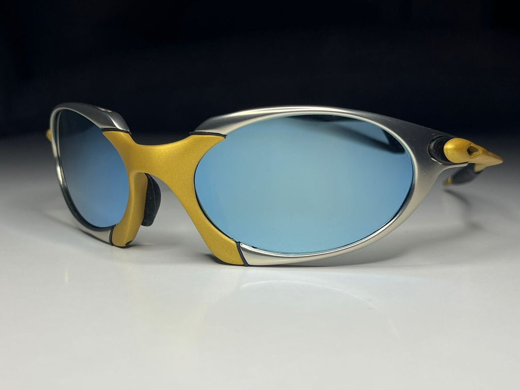 Predator- Gold and Silver Frames - Lite Blue Lenses Polarized