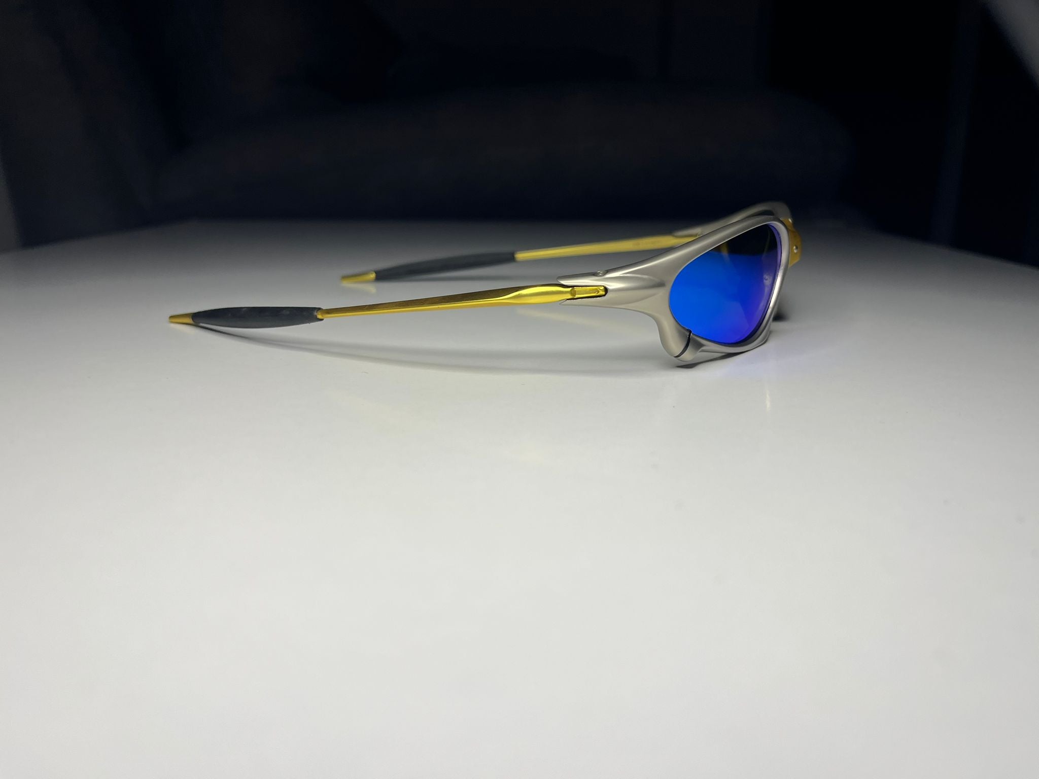 Axiom- 24K Gold and Plasma Frames- Metallic Blue Lenses- Polarized