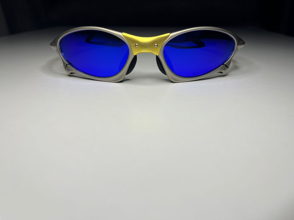 Axiom- Titanium/Gold Frame- Blue Lenses- Polarized