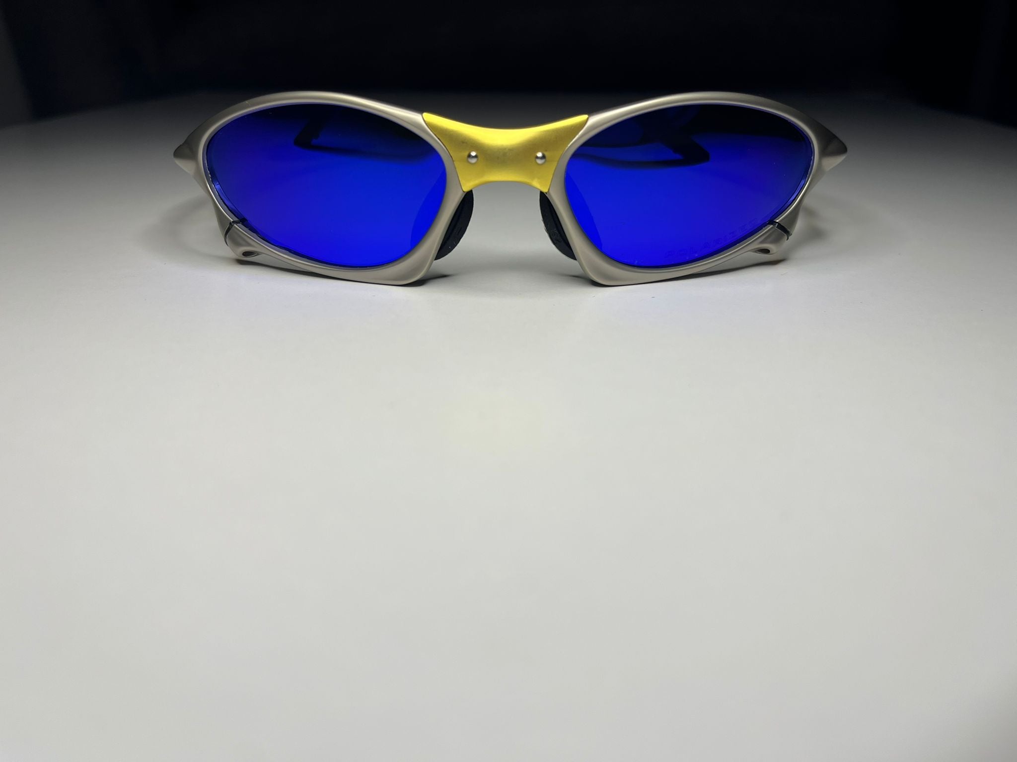 Axiom- Titanium/Gold Frame- Blue Lenses- Polarized