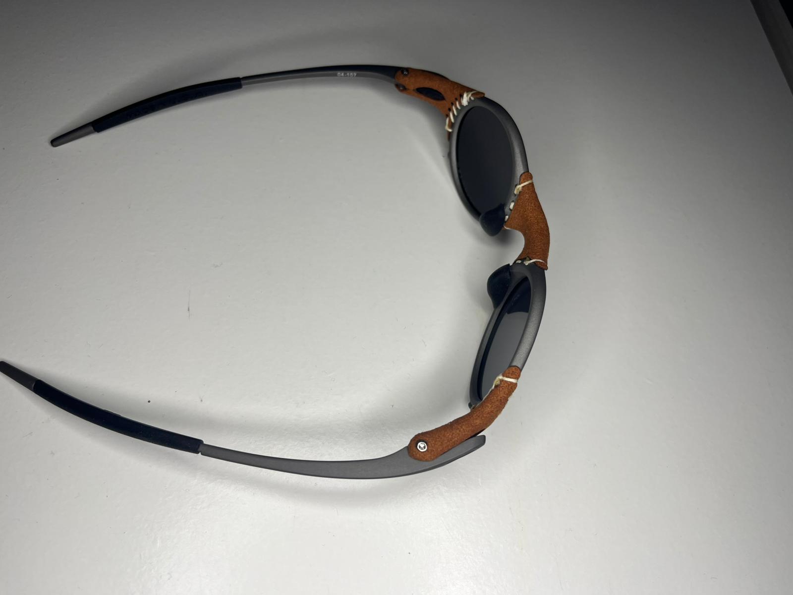 SteamPunk- Titanium Covered Leather- Metallic Blue Green Lenses- Polarized