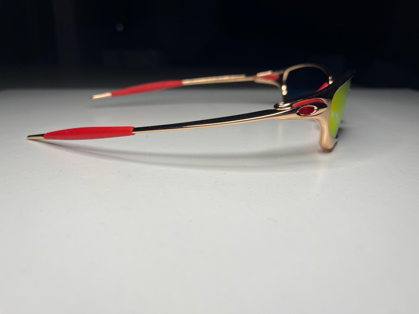 Resolute- Metallic Bronze Frames- Red Rubbers- Metallic Orange Lenses- Polarized